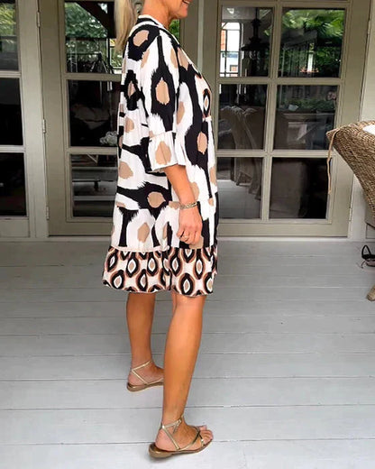 Emma - Pleated dress with spotted pattern