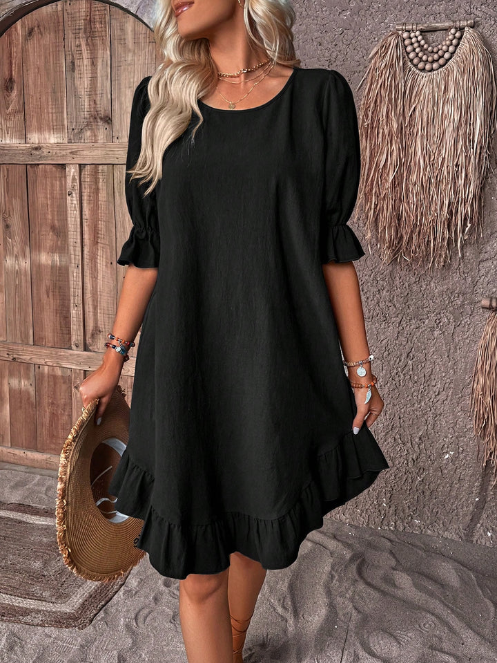 Solid dress with puff sleeves and ruffle hem